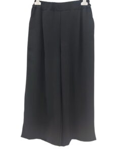 Pantalón culotte de verano para chica en color negro, corte amplio y largo midi, con cintura elástica y bolsillos al bies, en