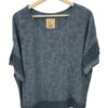 Blusa blanca de chica con relieve y detalle de puntilla en mangas y cuello, tejido ligero de viscosa y nylon, acabado en gasa