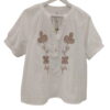 Blusa blanca para chica de algodón con cuello en V y bordado de trébol en el pecho, manga larga y corte clásico