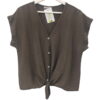Camisa de chica sin mangas en color blanco, corte recto, cuello en V, tejido con relieve visible y textura original en viscoc
