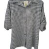 Camisa de chica amplia con estampado de cuadros en azul marino y blanco, tejido ligero, cuello clásico, botones frontales y m