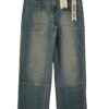 Pantalón vaquero wide leg para chica en denim azul medio, corte amplio, efecto lavado con zonas claras, cinco bolsillos y sin