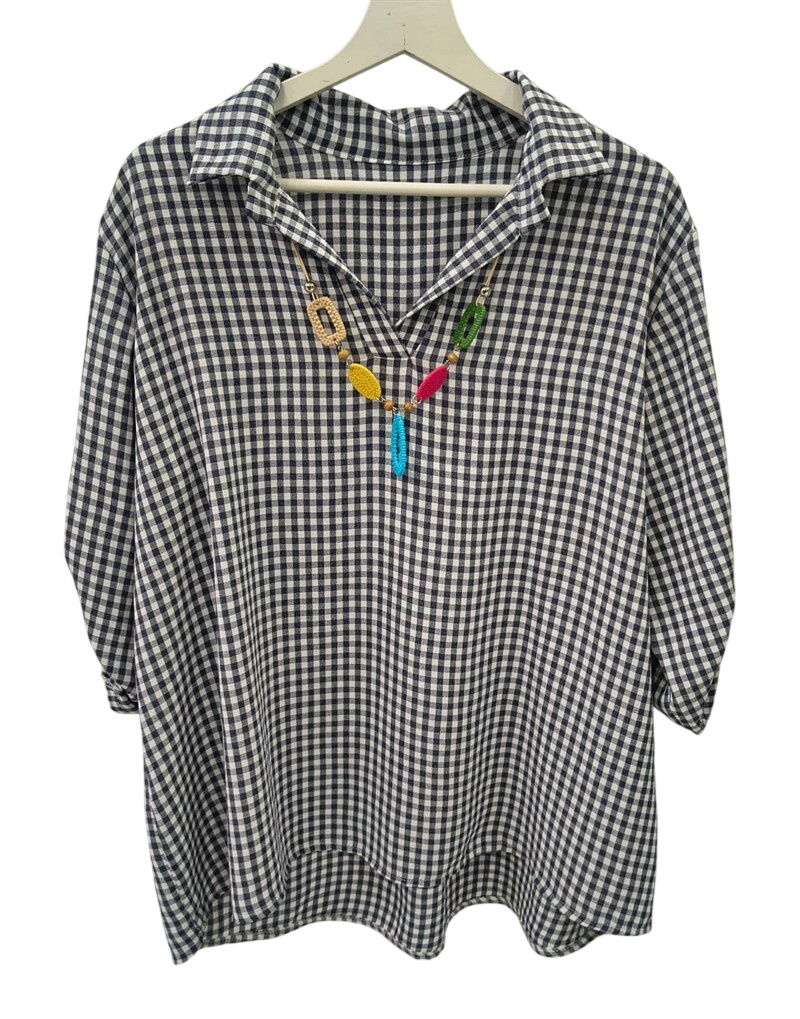 Blusa de cuadros blanco y azul para chica confeccionada en algodón, corte holgado, cuello camisero con solapas amplias, manga