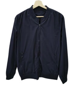 Cazadora fina tipo bomber para chico en azul marino oscuro, con cuello, puños y dobladillo acanalados, cremallera frontal y 2