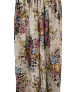 Falda larga de flores para chica en tonos rosas, azules y amarillos sobre fondo claro, con cintura alta y cinturón trenzado