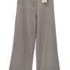 Pantalón ancho de tela para chica en color gris medio, corte fluido, con dobladillo vuelto en el bajo y bolsillos laterales