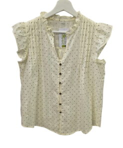 Blusa sin mangas para chica en tono beige claro, con puntos negros, volantes en hombros, cuello mao y botones contrastados