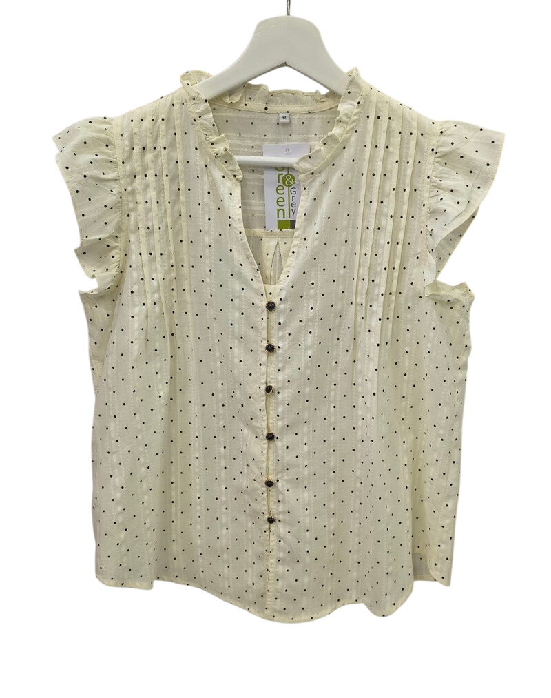 Blusa sin mangas para chica en tono beige claro, con puntos negros, volantes en hombros, cuello mao y botones contrastados