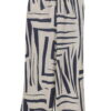 Pantalón flojo largo para chica con estampado asimétrico bicolor en azul marino y blanco, cintura elástica y cinturón trenzad