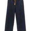 Pantalón ancho de chica en azul marino con corte holgado, cintura elástica, bolsillos al bies y cinturón trenzado marrón con