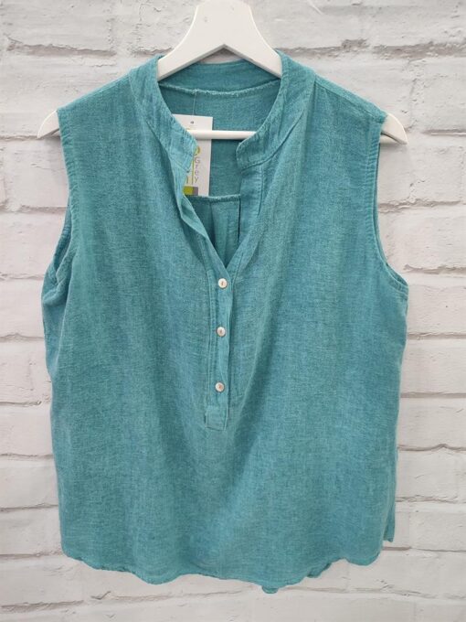 Blusa monocolor sin mangas,escote pico con 3 botones,bajo de forma redondeada,100%algodón.