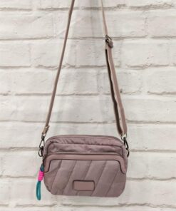 Bolso pequeño monocolor ,con asa ajustable bicolor y extraíble;dos departamentos exteriores con cierre de cremallera.