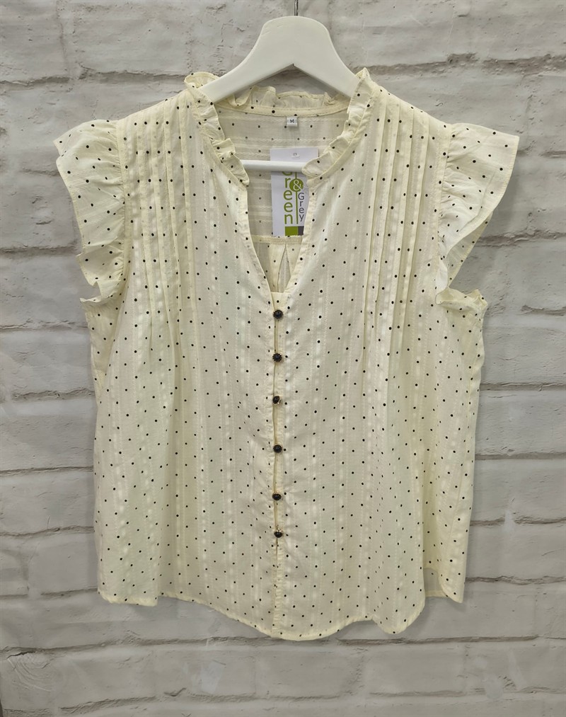 Camisa volantes y puntos