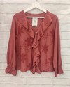 Blusa con volante y bordados