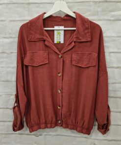 Camisa monocolor goma bajo